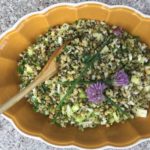 mung bean and quinoa salad in a bowl and topped with purple flowers by hudson valley personal chef