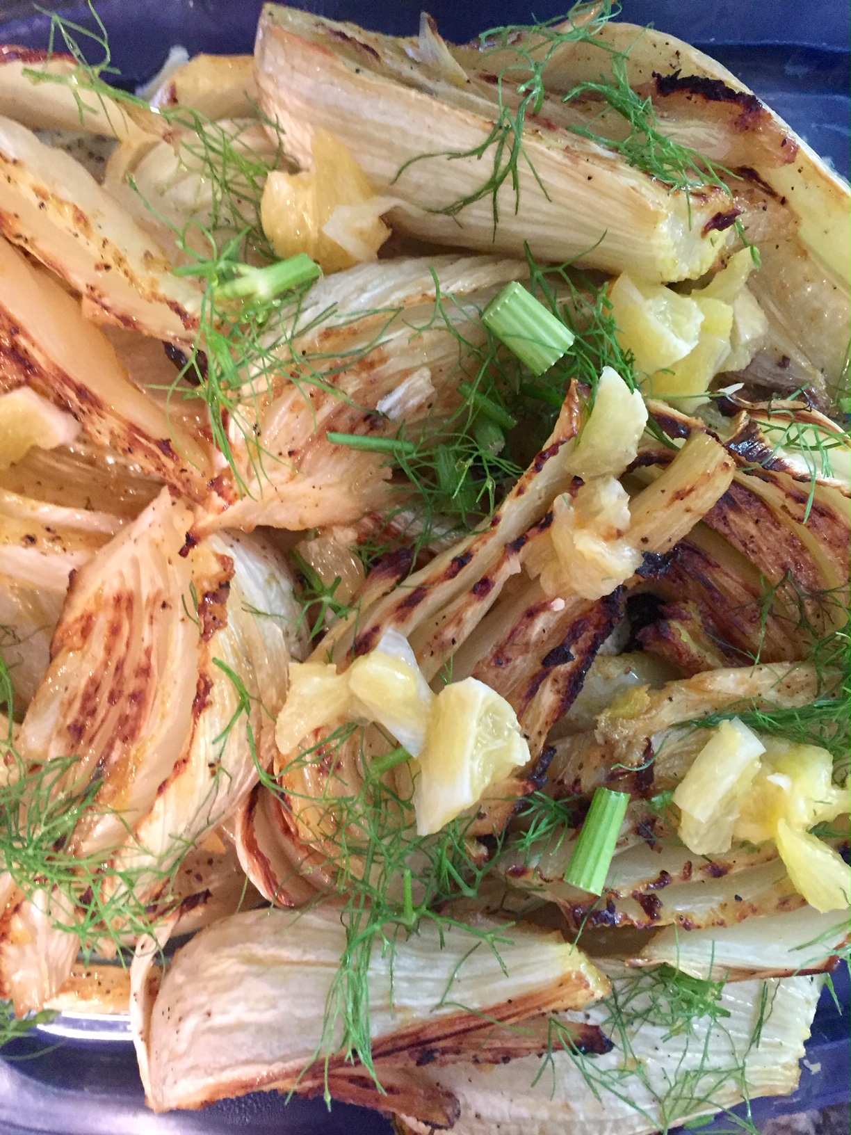 citrus roasted fennel served on a plate