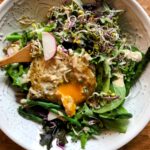 spring time asparagus salad in a white bowl